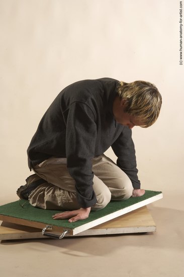 Casual Man White Slim Short Blond Sitting poses - ALL Sitting poses - on knees Academic