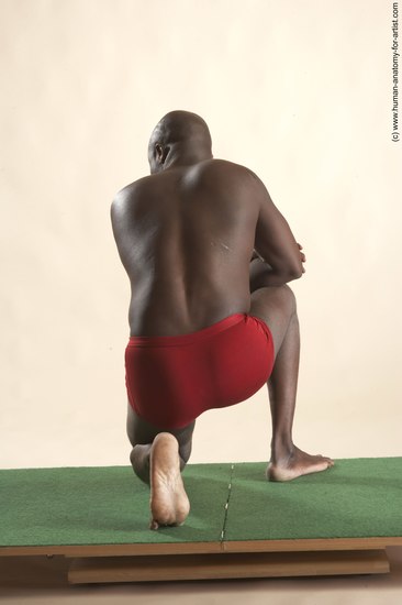 Underwear Man Black Kneeling poses - ALL Average Bald Kneeling poses - on one knee Academic