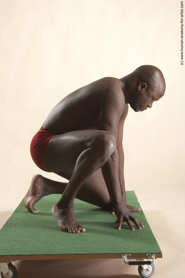 Underwear Man Black Kneeling poses - ALL Average Bald Kneeling poses - on one knee Academic