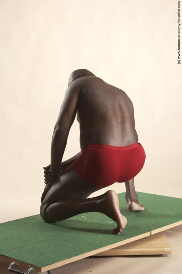 Underwear Man Black Kneeling poses - ALL Average Bald Kneeling poses - on one knee Academic