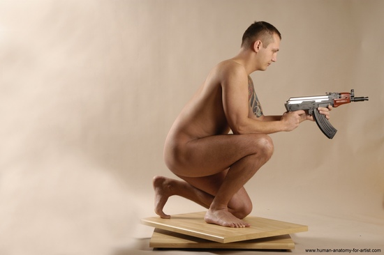 Nude Fighting with spear Man White Kneeling poses - ALL Average Short Brown Kneeling poses - on one knee Realistic