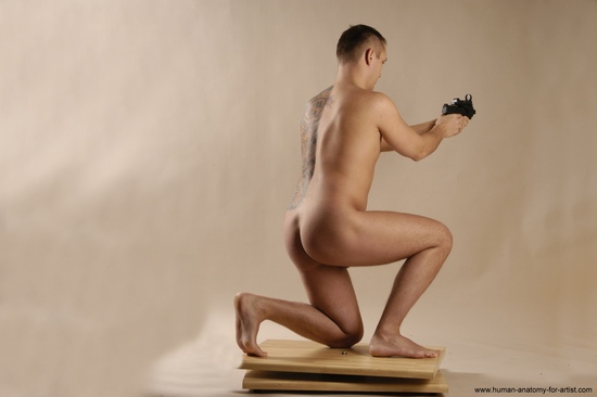 Nude Fighting with gun Man White Kneeling poses - ALL Average Short Brown Realistic