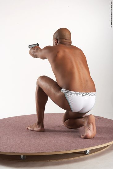 Underwear Fighting with gun Man Black Kneeling poses - ALL Average Bald Kneeling poses - on one knee Academic