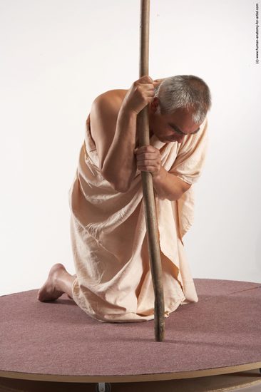 Drape Fighting with spear Man White Kneeling poses - ALL Average Short Grey Kneeling poses - on both knees Academic