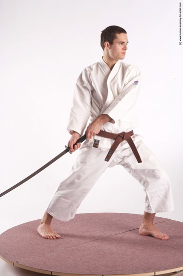 Sportswear Fighting with sword Man White Standing poses - ALL Athletic Short Brown Standing poses - simple Academic