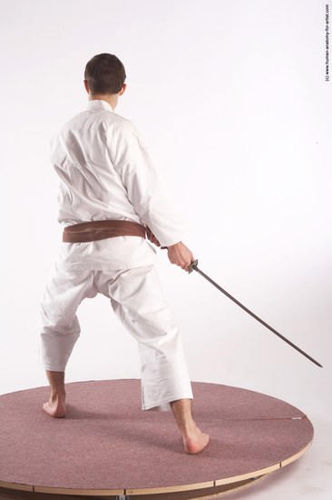 Sportswear Fighting with sword Man White Standing poses - ALL Athletic Short Brown Standing poses - simple Academic