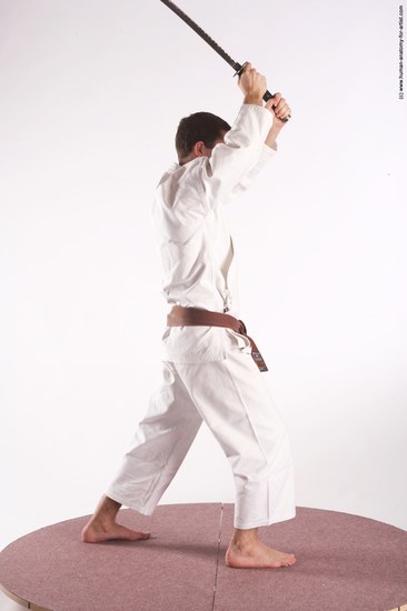 Sportswear Fighting with sword Man White Standing poses - ALL Athletic Short Brown Standing poses - simple Academic