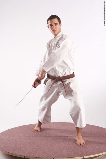 Sportswear Fighting with sword Man White Standing poses - ALL Athletic Short Brown Standing poses - simple Academic