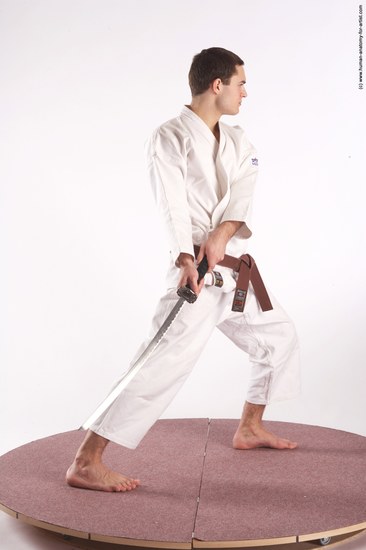 Sportswear Fighting with sword Man White Standing poses - ALL Athletic Short Brown Standing poses - simple Academic