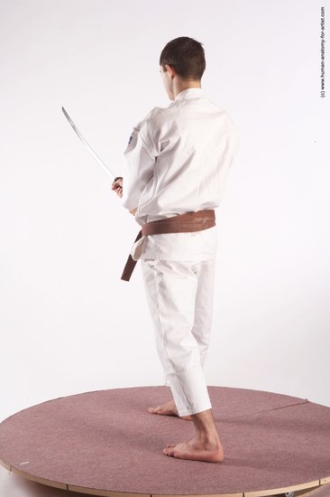 Sportswear Fighting with sword Man White Standing poses - ALL Athletic Short Brown Standing poses - simple Academic