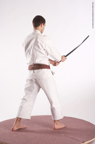 Sportswear Fighting with sword Man White Standing poses - ALL Athletic Short Brown Standing poses - simple Academic