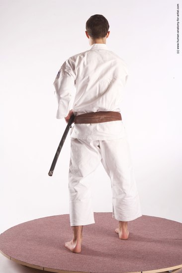 Sportswear Fighting with sword Man White Standing poses - ALL Athletic Short Brown Standing poses - simple Academic