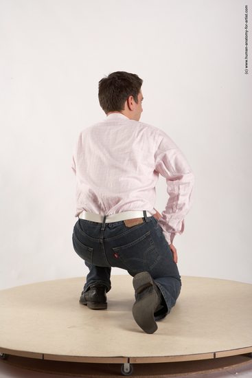 Casual Man White Kneeling poses - ALL Average Short Brown Kneeling poses - on one knee Academic