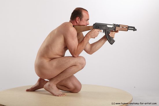 Nude Fighting with submachine gun Man White Kneeling poses - ALL Average Short Brown Kneeling poses - on one knee Realistic