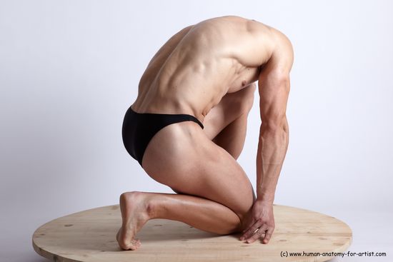 Swimsuit Man White Kneeling poses - ALL Muscular Short Brown Kneeling poses - on one knee Academic