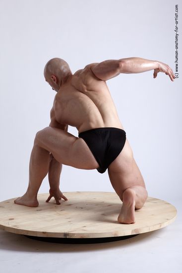 Swimsuit Man White Kneeling poses - ALL Muscular Bald Kneeling poses - on one knee Academic