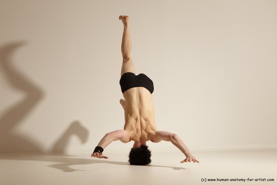 Underwear Gymnastic poses Man White Athletic Short Black Dancing Dynamic poses Academic