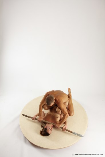 Nude Fighting with spear Woman - Man White Laying poses - ALL Slim Short Brown Laying poses - on back Multi angles poses Realistic