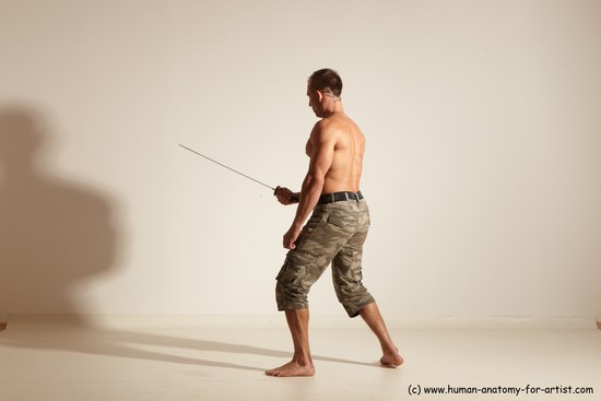 Casual Fighting with sword Man White Standing poses - ALL Muscular Short Brown Standing poses - simple Dynamic poses Academic