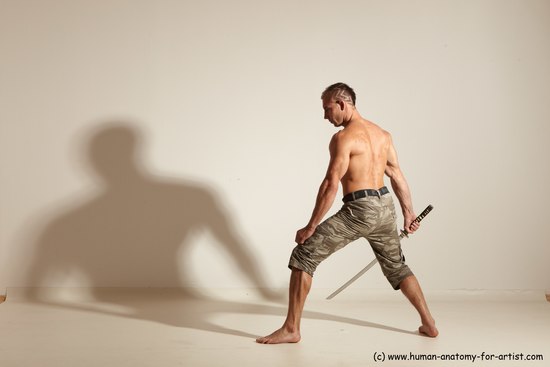 Casual Fighting with sword Man White Standing poses - ALL Muscular Short Brown Standing poses - simple Dynamic poses Academic