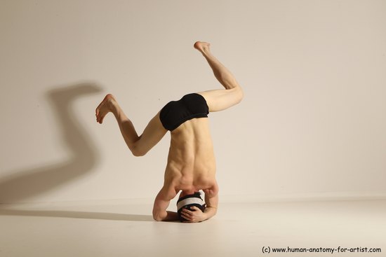 Underwear Gymnastic poses Man White Athletic Short Black Dancing Dynamic poses Academic