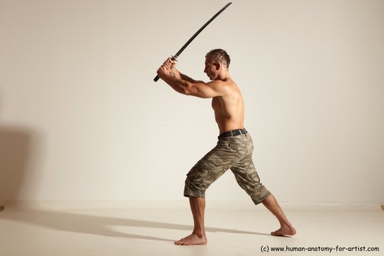 Casual Fighting with sword Man White Standing poses - ALL Muscular Short Brown Standing poses - simple Dynamic poses Academic