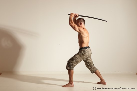 Casual Fighting with sword Man White Standing poses - ALL Muscular Short Brown Standing poses - simple Dynamic poses Academic