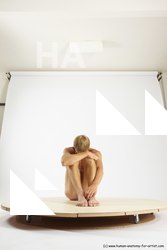 alexandr sitting 13c