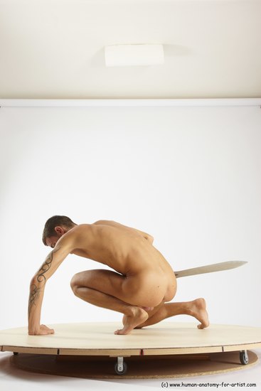 Nude Fighting with sword Man White Kneeling poses - ALL Athletic Short Brown Kneeling poses - on one knee Multi angles poses Realistic