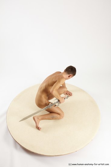 Nude Fighting with sword Man White Kneeling poses - ALL Athletic Short Brown Kneeling poses - on one knee Multi angles poses Realistic