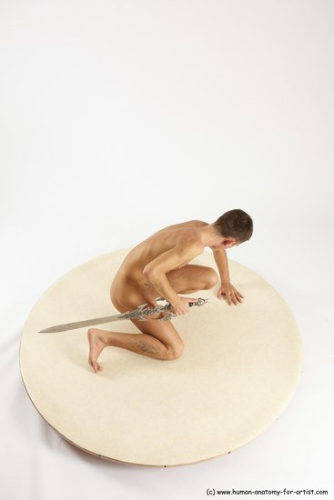 Nude Fighting with sword Man White Kneeling poses - ALL Athletic Short Brown Kneeling poses - on one knee Multi angles poses Realistic