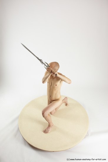 Nude Fighting with sword Man White Kneeling poses - ALL Slim Bald Kneeling poses - on one knee Multi angles poses Realistic