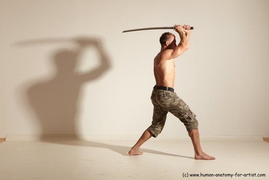 Fighting with sword Man White Moving poses Muscular Short Brown Dynamic poses Academic