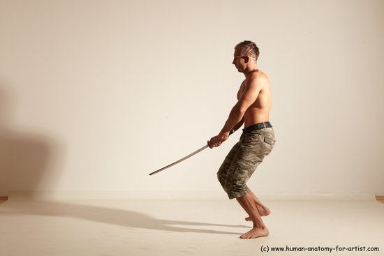 Fighting with sword Man White Moving poses Muscular Short Brown Dynamic poses Academic