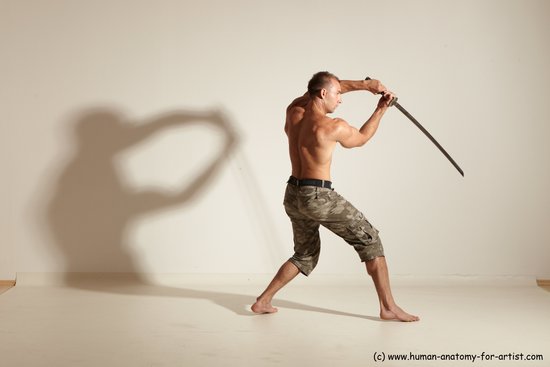 Fighting with sword Man White Moving poses Muscular Short Brown Dynamic poses Academic