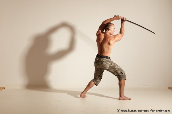 Fighting with sword Man White Moving poses Muscular Short Brown Dynamic poses Academic