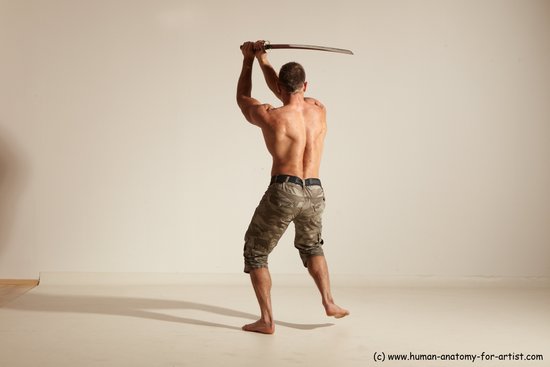 Fighting with sword Man White Moving poses Muscular Short Brown Dynamic poses Academic