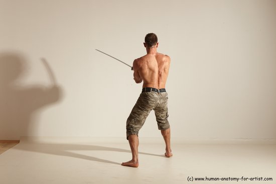 Fighting with sword Man White Moving poses Muscular Short Brown Dynamic poses Academic