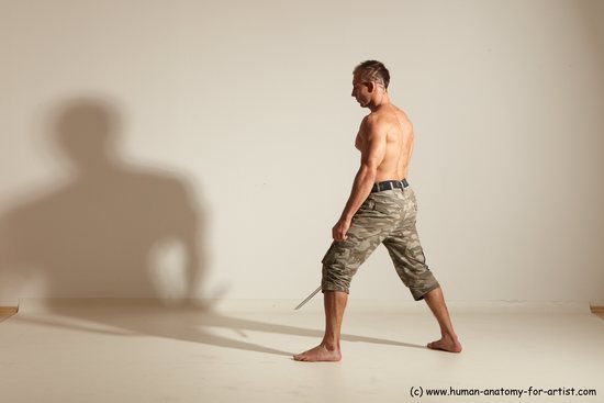 Fighting with sword Man White Moving poses Muscular Short Brown Dynamic poses Academic