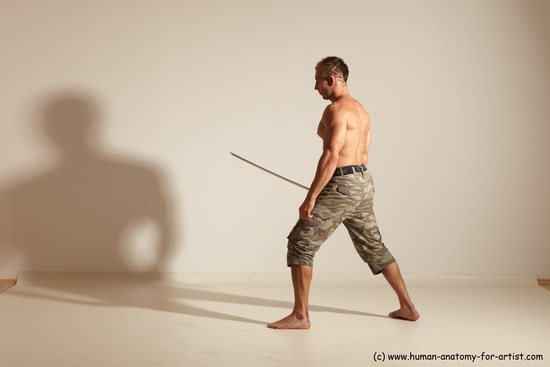 Fighting with sword Man White Moving poses Muscular Short Brown Dynamic poses Academic