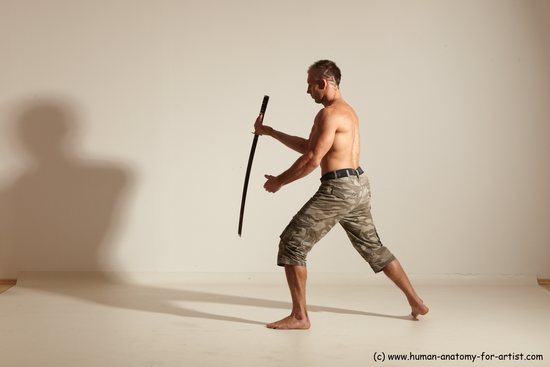 Fighting with sword Man White Moving poses Muscular Short Brown Dynamic poses Academic