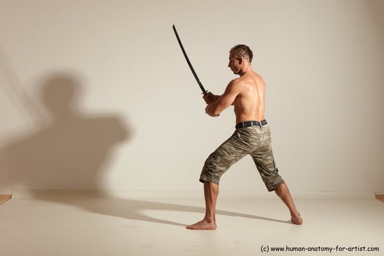 Fighting with sword Man White Moving poses Muscular Short Brown Dynamic poses Academic