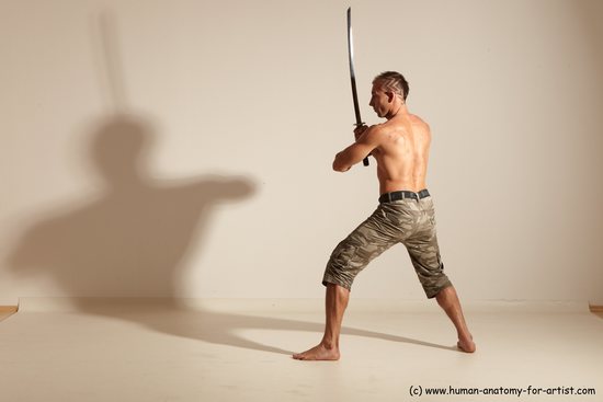 Fighting with sword Man White Moving poses Muscular Short Brown Dynamic poses Academic