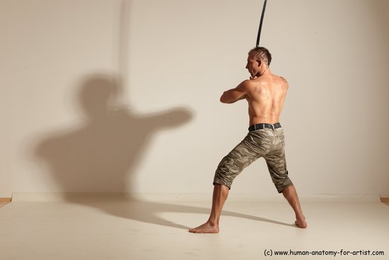 Fighting with sword Man White Moving poses Muscular Short Brown Dynamic poses Academic