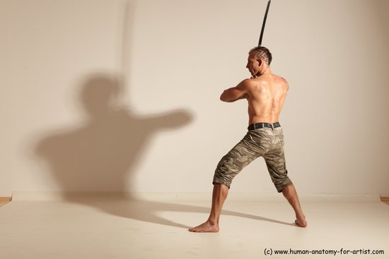 Fighting with sword Man White Moving poses Muscular Short Brown Dynamic poses Academic