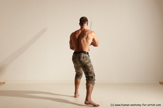 Fighting with sword Man White Moving poses Muscular Short Brown Dynamic poses Academic