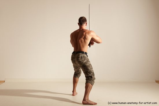 Fighting with sword Man White Moving poses Muscular Short Brown Dynamic poses Academic