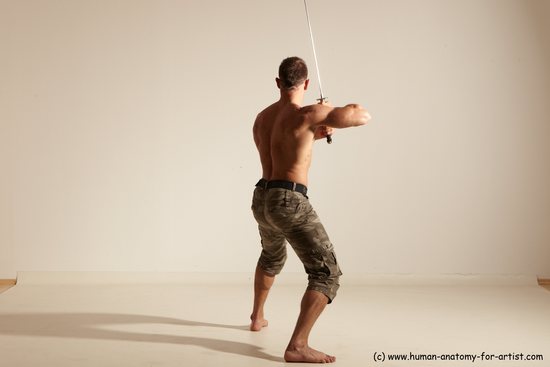 Fighting with sword Man White Moving poses Muscular Short Brown Dynamic poses Academic