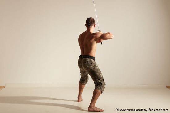 Fighting with sword Man White Moving poses Muscular Short Brown Dynamic poses Academic