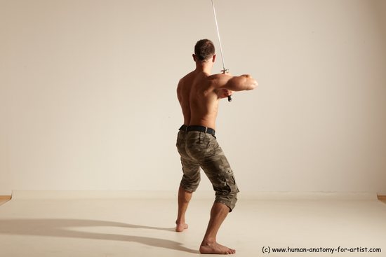 Fighting with sword Man White Moving poses Muscular Short Brown Dynamic poses Academic